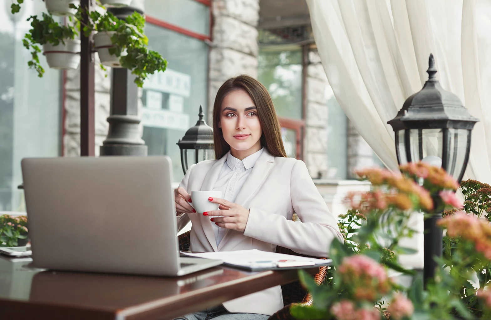 young-businesswoman-outdoors-working-with-laptop
